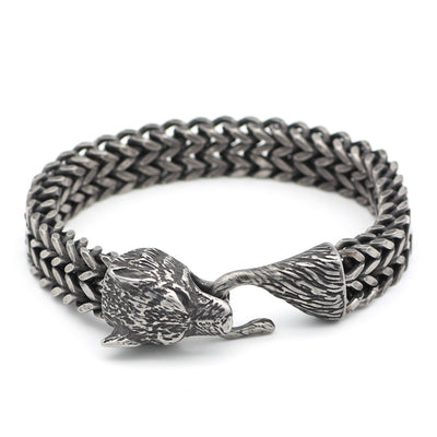 Steel vintage men's bracelet featuring a detailed black wolf head clasp and Cuban chain, ideal for fashion-forward accessories or gifts.