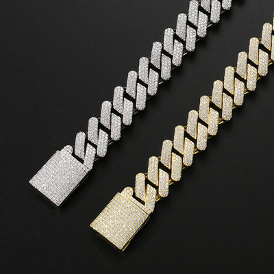 Side-by-side comparison of silver and gold zircon hip hop necklaces with Cuban chain links and iced-out box clasps.