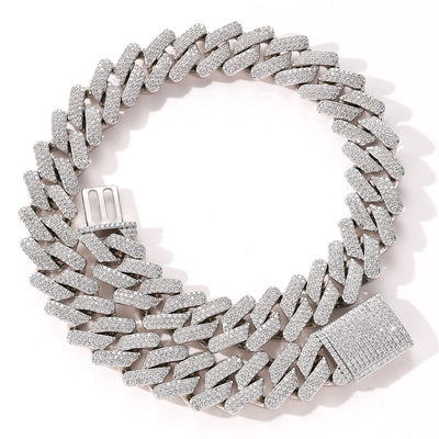Zircon Cuban chain necklace in silver tone with real gold plating, copper construction and detailed iced-out clasp on white background.